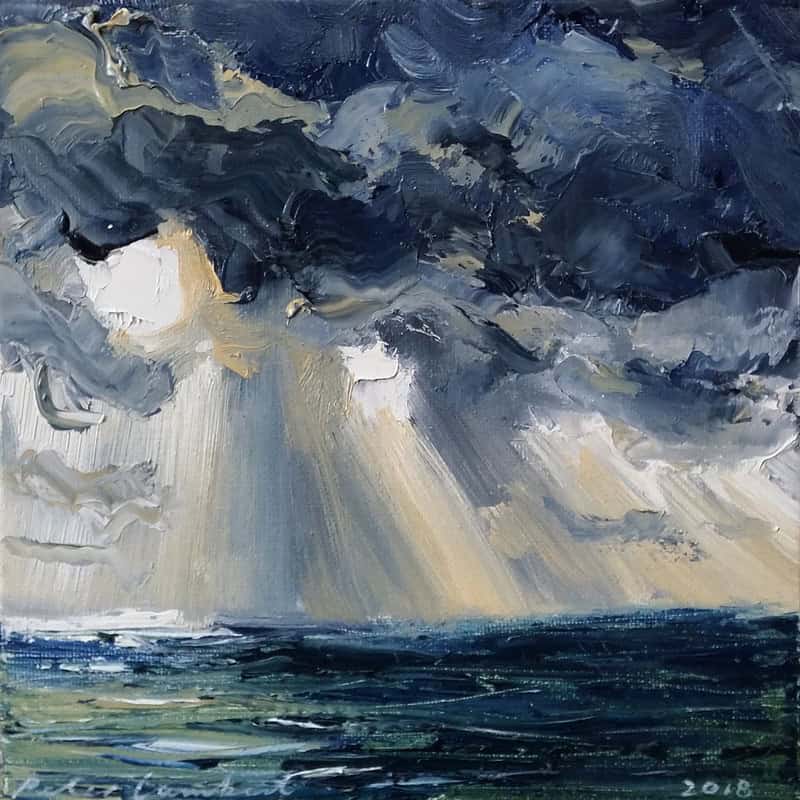 “Sunbeams and Rainfront out at sea”